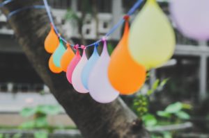 These balloons serve both as decoration and activity. Fill balloons with water, hang them around banner-style, and invite guests to pick them off and start a balloon fight!