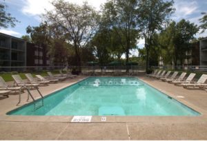 Tree-lined privacy, swimming pool and tennis court plus a prime location for reaching Rochester in minutes for all residents of Olympik Village Apartments. 