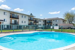 Residents of Canyon Lake Apartments enjoy a quick dip, or a relaxing day poolside.