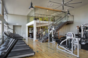 Olympus Corsair Fitness Club equipped with Technogym cardio, weight training, and TRX equipment, punching bag, and a private yoga and dance studio with fitness on demand. 