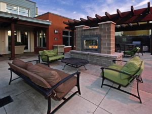 Make friends with your neighbors at the relaxing outdoor lounger and fireplace. 