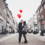 Valentines Day Couple Holding Hands Heart Shaped Balloons