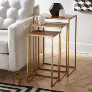 square brass end tables, each one smaller than the last so that they can be pushed underneath one another for storage